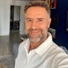 Graeme P.